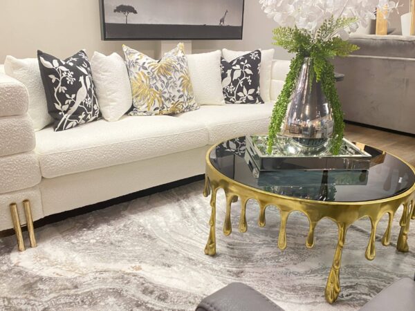 GOLD ALUMINUM DRIP COFFEE TABLE WITH MELTING DESIGNED LEGS AND SHADED GLASS TOP - Image 4