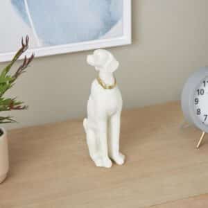 CREAM POLYSTONE SITTING DOG SCULPTURE WITH GOLD COLLAR