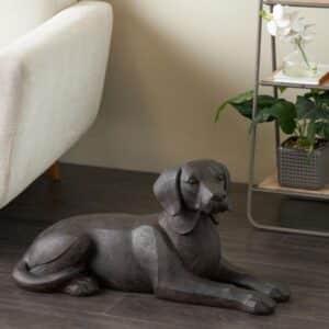 BLACK DOG SITTING SCULPTURE